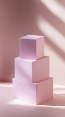 Obraz premium Three empty pink cubes on soft minimalist background, perfect for showcasing beauty products