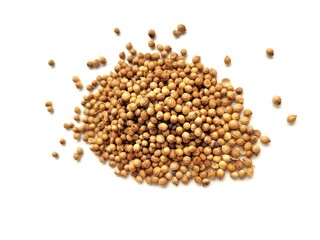 Raw portion of coriander seeds, on a white background.