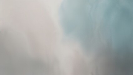 Soft blue and gray abstract background, ethereal atmosphere, gentle colors, copy space