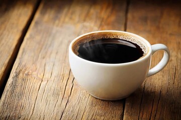 Obraz premium A Warm Cup of Coffee on Rustic Wooden Table