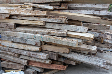 Stack of Used Construction Wood for Industrial and Building Purposes