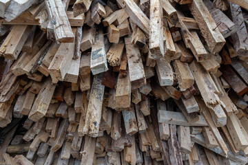 Stack of Used Construction Wood for Industrial and Building Purposes