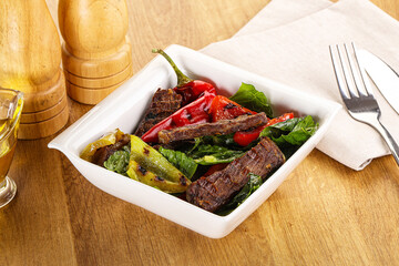Salad with grilled beef steak