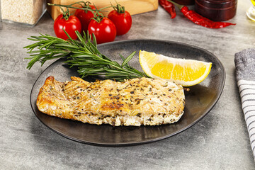 Baked salmon fish served rosemary