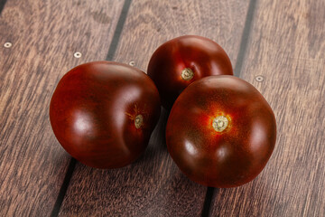 Obraz premium Organic natural juicy Kumato tomato