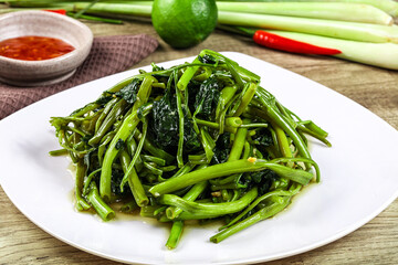 Asian cuisine stir fried morning glory