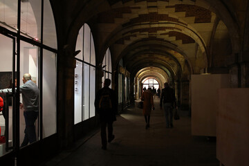 Alley way inside the Place des Vosges at night - Marais quarter - Fourth arrondissement - Paris - France
