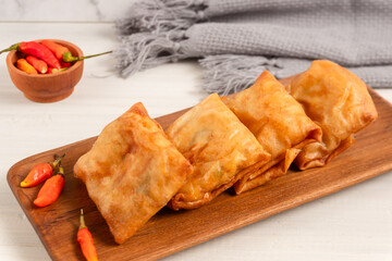 Martabak Tahu or Tofu Spring Rolls. Is traditional snacks in Indonesia.perfect for recipe, article, catalogue, or any commercial purposes. with copy space.