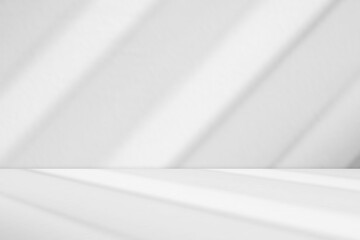 Abstract white studio room with light and shadow from window background for product display presentation