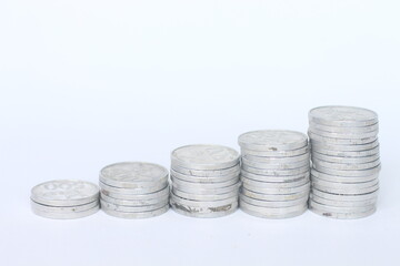 Silver coins stacks isolated on a white background. Indonesian rupiah coin. 500 rupiah coin. metal money