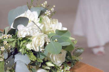 Wedding bouquet of the bride from white roses