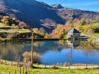 Fototapeta premium Lonely cabin next to a lake, Vall de Lago village, Somiedo Natural Park and Biosphere Reserve, Asturias, Spain, Europe