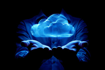 Cloud Computing: A businessman holds a glowing blue cloud in his cupped hands, symbolizing the power and potential of cloud computing. This image evokes a sense of innovation, accessibility.