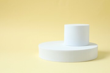 Props for product photography. Different podiums on a colored background