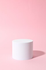 Props for product photography. Podium on a colored background