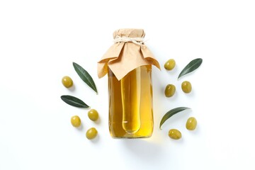 Bottle of fresh olive oil and olives with leaves on white background