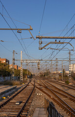 Train track with a few trains on it