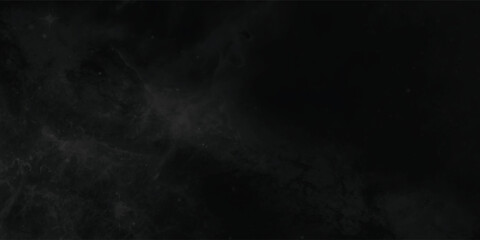 Mystical cosmic scene with ethereal shades of gray and black featuring wisps of stellar dust floating in the vast emptiness of space
