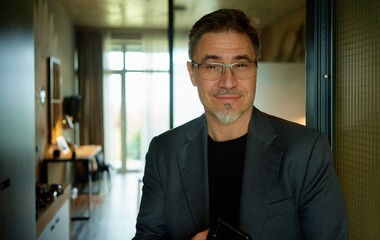 Business portrait - businessman in office. Mature age, middle age, mid adult casual man in 50s,...