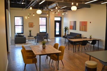 Modern Open Workspace with Stylish Decor and Comfortable Seating