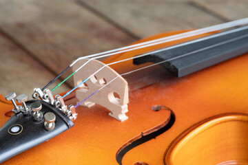 Music instrumnet viloin macro in a wooden table