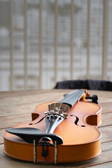 Music instrumnet viloin macro in a wooden table