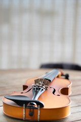 Music instrumnet viloin macro in a wooden table