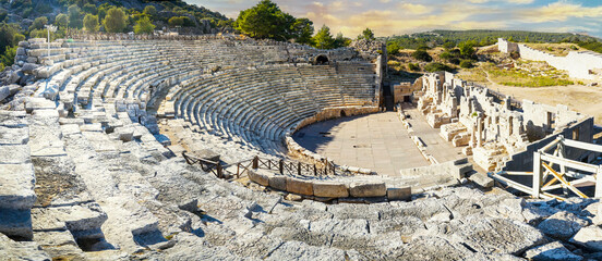 Patara (Pttra). Ruins of the ancient Lycian city Patara. Amphi-theatre and the  assembly hall of Lycia public. Patara was at the Lycia (Lycian) League's capital. Panoramic photo Antalya, TURKEY