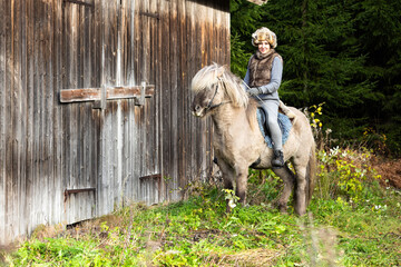 Icelandic horse riding. Rider has werewolf theme outfit