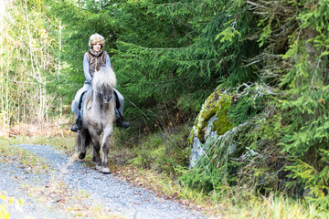 Icelandic horse riding. Rider has werewolf theme outfit