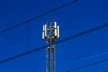 A tall mast with devices for transmitting television and mobile telephony signals in 5G technology