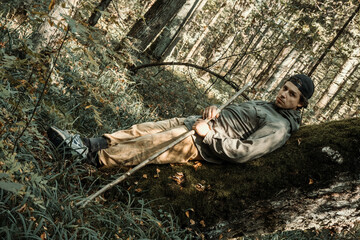 person relaxing in the woods