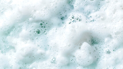 Obraz premium Bubbles and foam create abstract pattern in soft white and green hues, evoking sense of freshness and tranquility