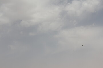 Clear blue sky over a barren landscape, capturing the vastness and simplicity of a desert scene.