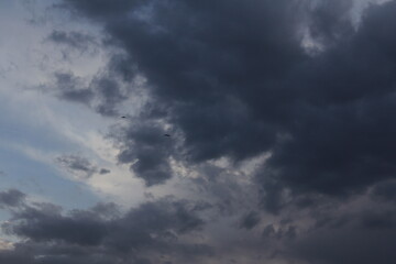 Storm clouds gathering in the sky, creating a powerful and dramatic atmosphere.