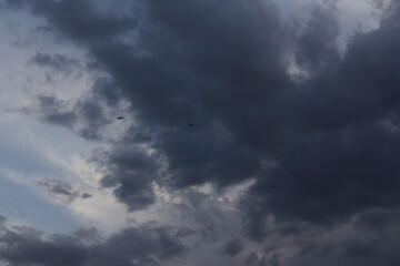 A moody sky with dark clouds, portraying nature�s intensity and serene mystery.