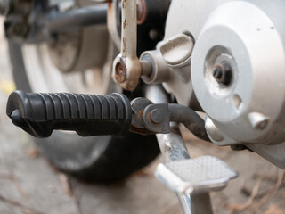 Motorcycle maintenance tips exploring essential components garage instructional guide mechanical environment close-up view motorcycling basics