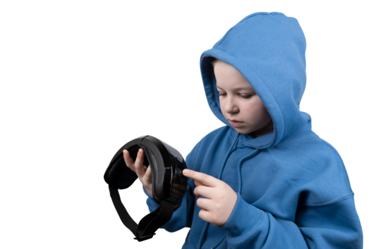 Girl with blue hoodie holds virtual reality headset in her hands on transparent background. Virtual reality glasses. Cyberspace, entertainment, online leisure concept