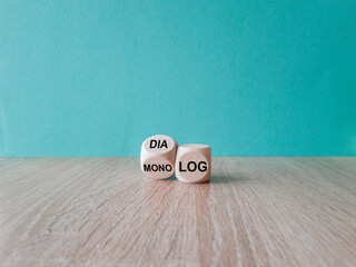 Turned a wooden cube and changes the German word Monolog (monologue) to Dialog (dialogue)....