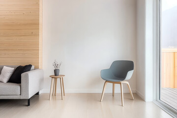 A minimalist living room with grey chair and wooden accents in bright natural light