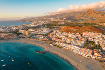 Aerial view of Playa de las Americas beach at sunset, Tenerife, Spain. © Mazur Travel