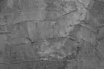 gray background, photo shows gray concrete wall close-up