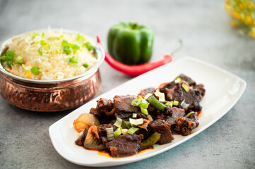 Delicious beef stir-fry with red and yellow bell peppers