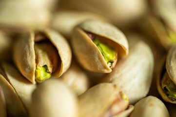 Pistachio nuts. Many pistachios in a pile.