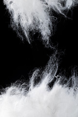 close up of torn polylactic acid fibers or zein fibers on black background.