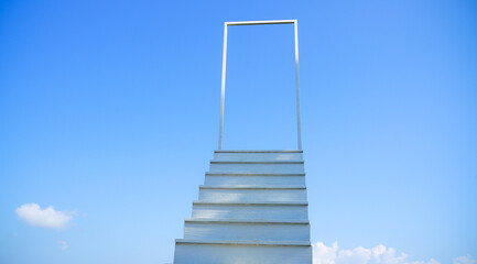 ladder to sky./White stairs and white doors amidst a bright sky./heavenly staircase