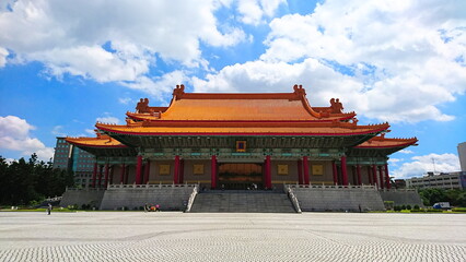 Obraz premium Taipei, Taiwan - 07.16.2017: Facade of the National Concert Hall at Liberty Square on the north of Chiang Kai-shek Memorial Square under a sunny blue sky with clouds