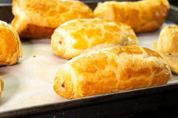Chocolate rolls made of puff pastry. Dessert. Pastry. Food concept. Puff pastry sticks