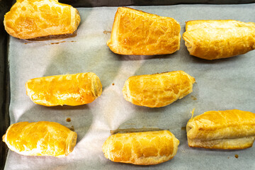 Chocolate rolls made of puff pastry. Dessert. Pastry. Food concept. Puff pastry sticks