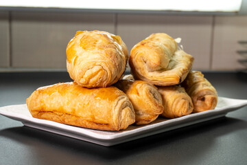 Chocolate rolls made of puff pastry. Dessert. Pastry. Food concept. Puff pastry sticks